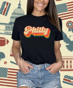 Introducing the Retro Philly Philadelphia T-Shirt, a must-have for all lovers of the City of Brotherly Love! This iconic t-shirt captures the essence of Philadelphia's rich history and vibrant culture, making it the perfect addition to your wardrobe. Crafted with meticulous attention to detail, this t-shirt showcases a retro-inspired design that pays homage to the city's iconic landmarks and symbols. From the Liberty Bell to the famous LOVE sculpture, each element is intricately woven into the fabric, creating a visually stunning and nostalgic piece of art. Made from premium quality, ultra-soft cotton, the Retro Philly Philadelphia T-Shirt offers unparalleled comfort and durability. Its breathable fabric ensures a cool and comfortable fit, making it ideal for everyday wear or special occasions. Whether you're exploring the city streets or relaxing with friends, this t-shirt will keep you feeling stylish and at ease. But the Retro Philly Philadelphia T-Shirt is more than just a fashion statement. It's a symbol of pride and connection to the city that holds a special place in your heart. By wearing this t-shirt, you become part of a community of passionate Philadelphians, united by their love for their hometown. Not only does this t-shirt offer style and comfort, but it also serves as a conversation starter. Imagine the stories and memories that will be shared as others recognize the iconic landmarks on your shirt. It's a fantastic way to connect with fellow Philadelphians or spark curiosity in those who have yet to experience the magic of this incredible city. With its timeless design and exceptional quality, the Retro Philly Philadelphia T-Shirt is a true value for any customer. It's a versatile piece that can be dressed up or down, allowing you to effortlessly express your love for Philadelphia in any setting. Whether you're a lifelong resident, a proud transplant, or simply a fan of this remarkable city, this t-shirt is a must-have addition to your collection. In summary, the Retro Philly Philadelphia T-Shirt is more than just a piece of clothing; it's a symbol of pride, a conversation starter, and a connection to the vibrant spirit of Philadelphia. Embrace the nostalgia, celebrate the landmarks, and wear your love for the City of Brotherly Love with pride. Get your Retro Philly Philadelphia T-Shirt today and let your passion for Philadelphia shine!