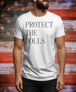 Jacob wearing a protect the dolls Tee Shirt