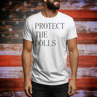 Jacob wearing a protect the dolls Tee Shirt