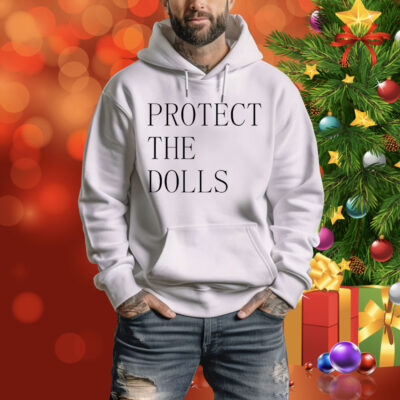 Jacob wearing a protect the dolls Tee Shirt