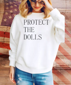 Jacob wearing a protect the dolls Tee Shirt